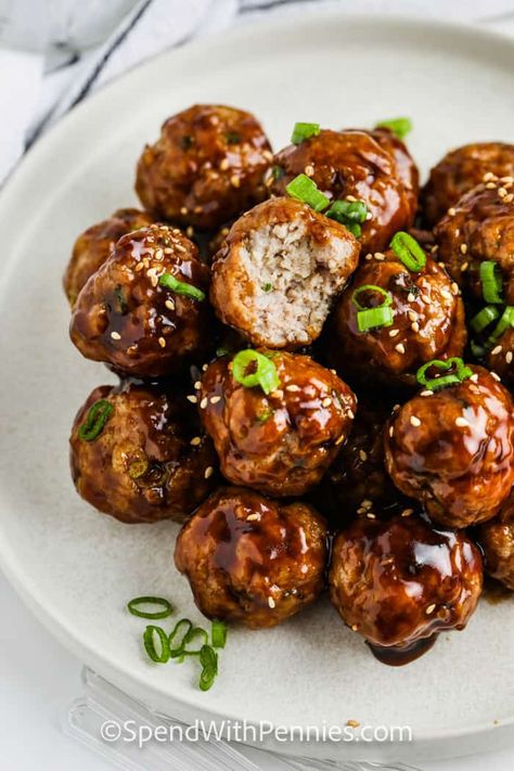 Hoisin Meatballs are an easy favorite appetizer. Tender pork meatballs are tossed in a sweet and sticky sauce. #spendwithpennies #hoisinmeatballs #recipe #meatballs #hoisin #asian #glaze #sauce #appetizer #best #juicy Hoisin Meatballs Recipe, Asian Meatballs Crockpot, Spicy Asian Meatballs, Frozen Meatballs Crockpot, Hoisin Meatballs, Asian Glaze, Asian Pork Meatballs, Hoisin Pork, Tender Meatballs