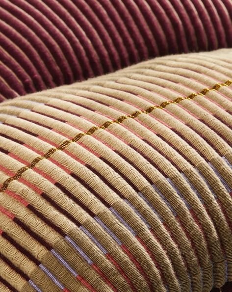 Designed by Dutch textile designer Mae Engelgeer and woven in San Jacinto, a municipality in the North of Columbia, the Chumbes cylinder cushion features an intricate stripe design inspired by the Chumbe Inga, a traditional Colombian garment. Two different hand-woven motifs create a ribbed structure that is pleasant to the touch while metallic threads give it a pleasing lustrous shine. Similar to the hammocks that are produced in the region, the textiles are woven by craftswomen using vertical looms. It takes up to ten days for the women artisans to produce one cushion. Chumbes makes a lively addition to any sofa or lounge chair. This product comes in other colours. Woven Textiles, Rectangular Cushion, Woven Chair, San Jacinto, Textile Designer, Hand Woven Textiles, Wall Sculpture Art, Women Artisans, Floor Lamp Table