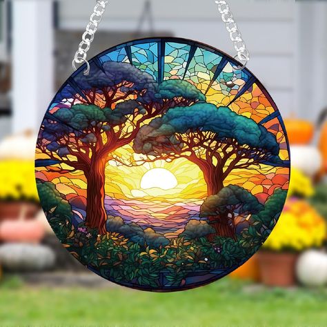 PRICES MAY VARY. Tree of Life Sunset Pendant: Set includes chains and suction cups. Our Tree of Life Sunset pendant features the shape of the Tree of Life and a golden sunset, reflecting the vibrant colors of the plant kingdom. Easy to Install: The suncatcher is suitable for hanging on windows, walls, or anywhere you desire. It comes with a metal chain for quick and easy hanging. With the metal chain, it is even more convenient to place it wherever you want. Product size: Made of acrylic materia Tree Of Life Stained Glass, Trees And Sunset, Window Hanger, Big Trees, Window Suncatchers, Round Window, Stained Glass Suncatcher, Outdoor Garden Decor, Big Tree