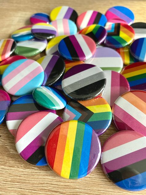 Any pride flag buttons- perfect for Pride (or pride all year!) You can choose 1 inch (25 mm) pins, 1.25 inch (32mm) pins, or a combo of both.  Progress pride flag Lesbian pride flag Rainbow Pride flag Inclusive Pride flag Original Gilbert Baker pride flag Non binary pride flag Demisexual pride flag Demigirl pride flag Demiboy pride flag Intersex pride flag Agender pride flag Transgender pride flag Bisexual pride flag Pansexual pride flag Two Spirit pride flag Queer pride flag Asexual pride pride Queer Pride Flag, Bear Pride Flag, Gilbert Baker, Pride Pins, Agender Pride, Pride Lesbian, Genderfluid Pride, Pride Stuff, Bisexual Pride Flag