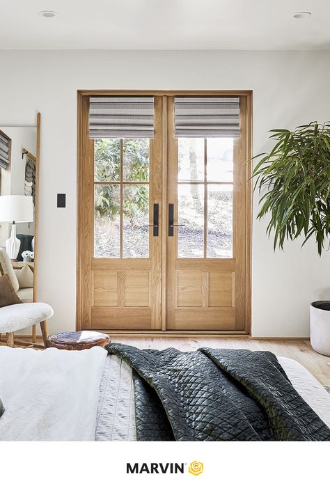 Emily Henderson used Marvin windows and doors to bring natural light into this space. These white oak doors balance out the neutral colors to achieve a soft yet subtly moody guest suite.  

📷: Sara Tramp for EHD. Blackout Shades, Emily Henderson, Hunter Douglas, Oak Doors, Dining Nook, Guest Bed, Mountain Home, Mountain House, Window Coverings