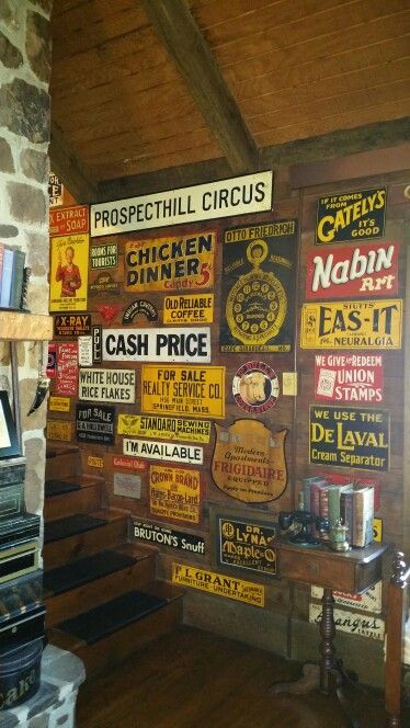 Vintage Metal Signs Kitchen Wall Decor, Vintage Metal Signs Decor, Tin Signs Diy Ideas, Grandma Painting, Shed Exterior Ideas, Vintage Signs Decor, Corrugated Metal Wall, Tin Sign Wall Decor, Fence Signs