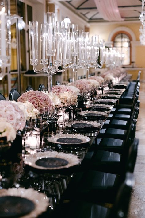 Long Black Tables with Pink Rose Centerpieces Black With Pink Wedding, Black Blush And White Wedding, Black And Light Pink Wedding Ideas, Table Set Ups For Parties, Blush Pink And Black Wedding Centerpieces, Wedding Color Combos Black, Blush Pink White And Black Wedding Reception Decoration, Pink Black And Silver Table Decor, Black White Pink Wedding Decor