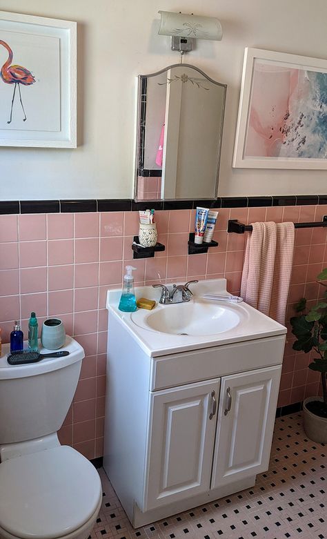 How To Save A Pepto-Bismol Pink Bathroom, According to an Interior Designer 1950s Pink And Black Bathroom, Vintage Pink Tile Bathroom Makeover, Retro Pink Tile Bathroom, Pink Black And White Bathroom, Old Pink Tile Bathroom Ideas, Mid Modern Bathroom, 1950s Bathroom Decor, Pink Tile Bathroom Ideas, Ugly Bathroom Makeover