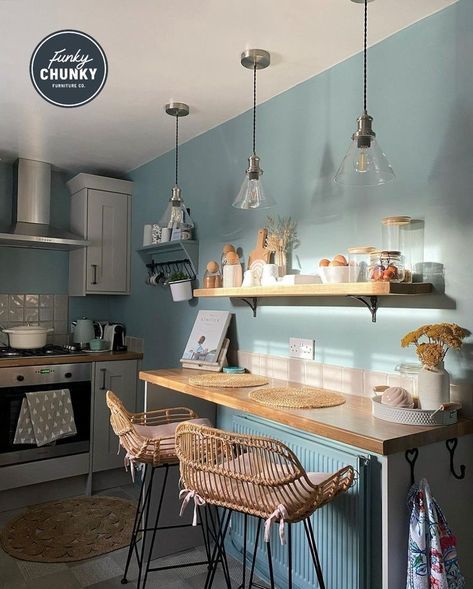 This image shows a kitchen breakfast bar area, the walls have been painted a light blue tone and there is one of our Birtley bracket shelves which has been used for storing kitchen essentials such as jars, egg cups and more! Kitchen Table For Small Kitchen, Terrace Kitchen Ideas, Table For Small Kitchen, Kitchen Table Design, Chunky Furniture, Shelves With Brackets, Bracket Shelves, Decoration Ideas Kitchen, Terrace Kitchen