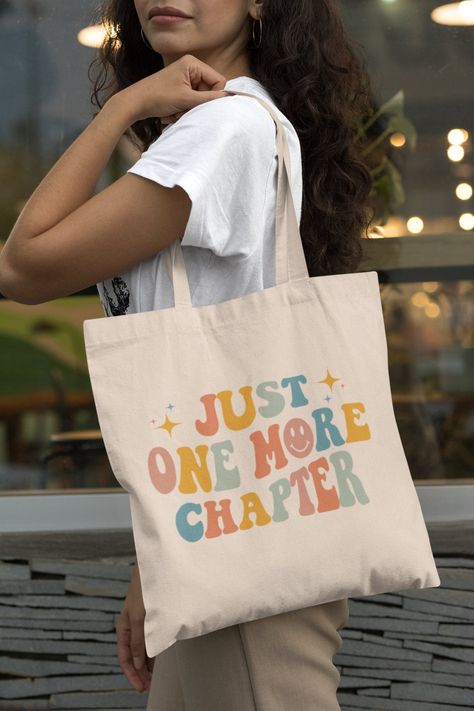 "Just One More Chapter Tote Bag is a perfect gift idea for readers, writers, teachers, librarians and all book nerds. Also available on tshirt : https://www.etsy.com/listing/1200918924/just-one-more-chapter-shirt-bookish sweatshirts : https://www.etsy.com/listing/1214878433/just-one-more-chapter-bookish-sweatshirt For other similar stuffs, click here: https://www.etsy.com/shop/TheNims?section_id=33576831 Browse through my other awesome items here: http://thenims.etsy.com/ ABOUT THE PRODUCT: Canv Desain Tote Bag, Sacs Tote Bags, Sac Tote Bag, Christian Tote Bags, Hen Party Gifts, Tote Outfit, Book Tote Bag, Best Friends For Life, Trendy Tote Bags