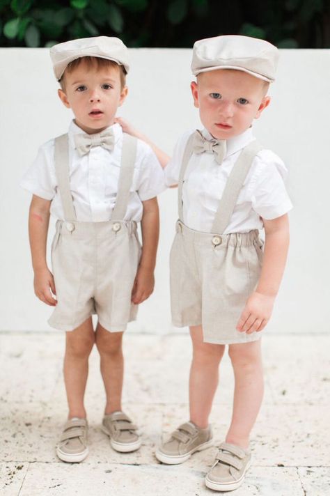 The sweetest ring bearer outfits: http://www.stylemepretty.com/2016/05/24/laid-back-cocktail-hour-wedding/ | Photography: Ozzy Garcia - http://ozzygarcia.com/ Ring Bearer Outfit Shorts, Toddler Ring Bearer Outfit, Ringbearers Outfits, Ring Bear, Bearer Outfit, Pink Sapphire Ring Engagement, Cocktail Hour Wedding, Vintage Engagement Rings Sapphire, Blue Topaz Engagement Ring