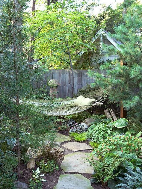 making your entire yard a private paradise, take one corner and transform it into a secluded getaway. A redbud just behind the hammock enhances the effect. Backyard Hammock, Outdoor Hammock, Landscape Projects, Garden Cottage, Garden Spaces, Shade Garden, Garden Paths, Dream Garden, Walkway