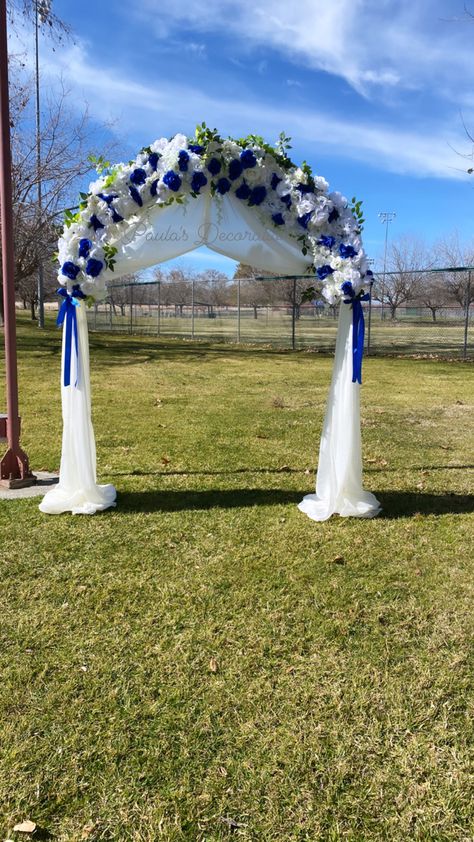 Royal Blue Wedding Backdrop Decor, Royal Blue Wedding Arch Ideas, Royal Blue Outside Wedding Ideas, Royal Blue And White Wedding Centerpieces, Royal Blue And White Wedding Flowers, Royal Blue Wedding Arch, Royal Blue And White Wedding Decorations, Black White And Royal Blue Wedding Decor, Royal Blue And Silver Wedding Decor