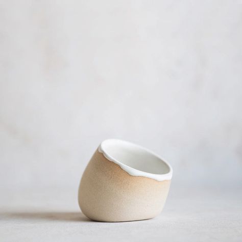 This open-top ceramic salt cellar holds a generous amount of sea salt and sits on a gentle pivot for convenient access. The exterior has been left raw to appreciate the raw beauty of this buff stoneware, and the interior has been glazed with a soft white satin glaze. KINDLY NOTE: Variations in glaze color, size, and finish are to be expected, this adds to the charm! approximate size: 3.5" wide, 2.5" tall dishwasher-safe, although we recommend handwashing to extend the life of your tumbler each p Ceramic Dutch Oven, Brooms And Brushes, Pottery Inspo, Ceramic Accessory, Ceramics Inspiration, Hand Building, Scandinavian Ceramic, Kitchen Display, Quilted Gifts