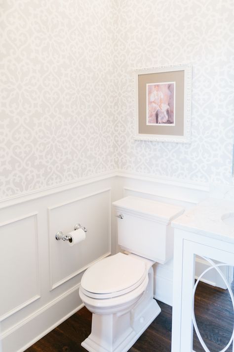 Powder room bathroom with beautiful wallpaper and wainscoting, designed by Interior Impressions. Blog post on how to spruce up your powder room!  #powderroomgoals #interiordesign #powderroomideas #wallpaper #wainscoting Small Bathroom Wainscoting Ideas, Bathroom Wainscoting Ideas, Half Bath Design, Bathroom Wainscoting, Makeover Kamar Mandi, Small Bathroom Wallpaper, Powder Room Wallpaper, French Country Bathroom, Bad Inspiration