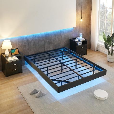 This floating bed frame is supported by nine inner legs reinforcing the main frame, and the four corners of the bed frame are supported by reinforced structural iron bars, providing maximum support to the bed frame. The inward folding bed legs design gives the visual perception of the bed frame floating in the air, presenting a modern, futuristic charm to your room. Bedroom With Floating Bed, Floting Bed, Floating Bed Frame Diy, Black Modern Bedroom, Bed Base With Storage, Floating Bed Diy, Male Room Ideas, Lights Headboard, Diy Platform Bed Frame