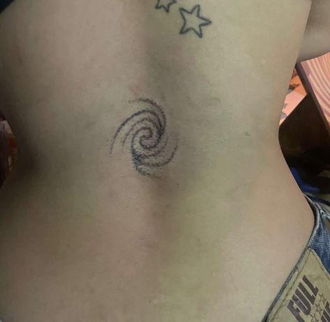 star tattoo, back tattoo, Spiral Tattoo On Shoulder, Spiral Back Tattoo, Swirl Tattoo Spirals, Unique Lower Back Tattoos, Stars Back Tattoo, Red Tramp Stamp, Stippled Tattoo, Symmetrical Chest Tattoo, Techno Tattoo Ideas