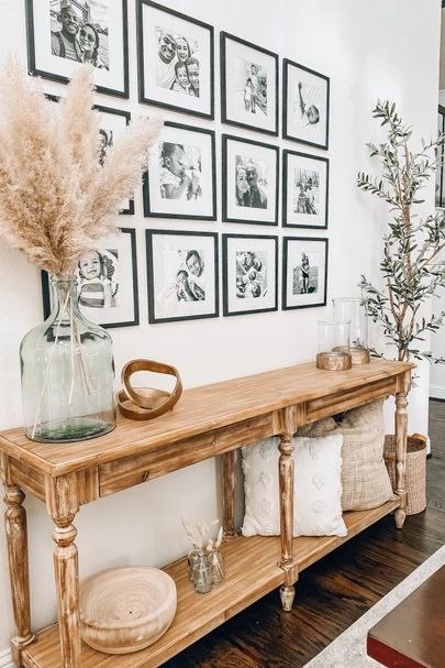 http://liketk.it/36fKI #liketkit @liketoknow.it console table decor, console tables, gallery walls, home decor, affordable decor, world market finds, Everett table, neutral home Hallway Table Decor, Console Table Decorating, Farmhouse Entryway, Entryway Table Decor, Foyer Table, Home Entrance Decor, Entrance Decor, Entryway Decor, Home Decor Inspiration