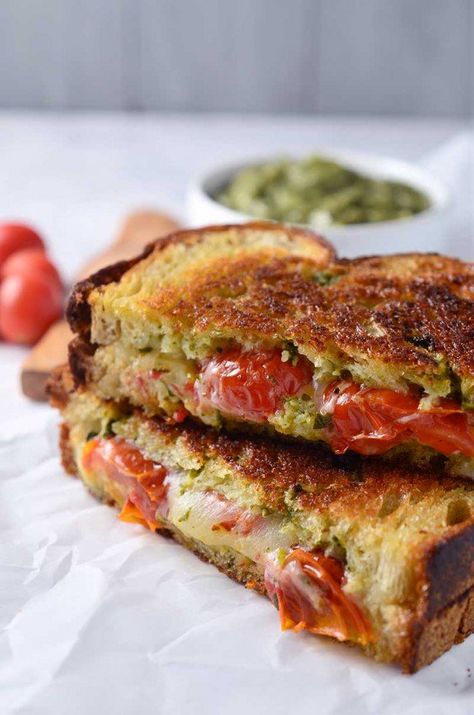 A decadent grilled cheese sandwich made with smoked provolone, roasted tomatoes and sweet pesto. Provolone Grilled Cheese, Roasted Tomato Pesto, Grilled Sandwiches, Grill Sandwich, Panini Recipes, Grilled Cheese Recipes, Tomato Pesto, Steak Sandwich, Grilled Sandwich