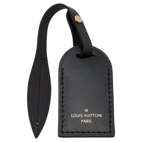 Rendered in leather, this luggage tag from Louis Vuitton will elevate the looks of your chic travel bags. It is designed in a simple shape with just the brand label on the front. It is complete with a leather strap holding a buckle. Keep your bags safe and recognizable with this awesome luggage tag. Luggage Tag Design, Luggage Tag Leather, Luggage Tag Designs, Leather Bag Tag, Louis Vuitton Luggage Tag, Luxury Luggage, Leather Luggage Tag, Product Tags, Travel Tags