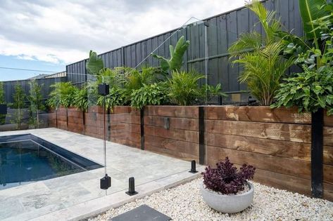 12 Inexpensive Retaining Wall Ideas for Your Backyard Backyard Concrete Wall Ideas, Wood Retaining Wall Ideas, Inexpensive Retaining Wall Ideas, Cheap Retaining Wall, Concrete Sleeper Retaining Walls, Wooden Retaining Wall, Pool Retaining Wall, Retaining Wall Fence, Small Retaining Wall