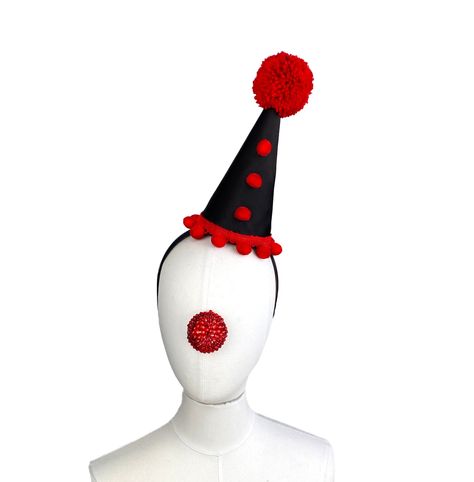 Red and Black Clown Hat with Pom Moms, Perriot Costume, Halloween, Birthday Party, Circus, Clown Headpiece, Burlesque This clown hat is made with a lush black satin with a red pom pom trim and a handmade pom pom on top. It slides onto a comfortable headbad so you can wear it in any position. Shipping Policy: All items are sent through the US Postal Service first class with tracking. Please convo for shipping upgrades. Please check out the rest of my store policies for information about Rush Orde Clown Hat Drawing, Diy Clown Hat, Clown Burlesque, Clown Headpiece, Clown Hats, Black Clown, Red Birthday Party, Clown Hat, Pom Mom