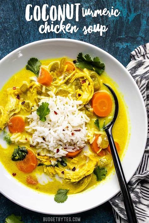 Warm, earthy, creamy and delicious! This Coconut Turmeric Chicken Soup is a fun twist on your comforting classic homemade chicken soup. Turmeric Chicken Soup, Coconut Lentil Soup, Turmeric Chicken, Homemade Chicken Soup, Cooking Jasmine Rice, Budget Bytes, Chicken Stew, Spinach And Feta, Chicken Soup Recipes