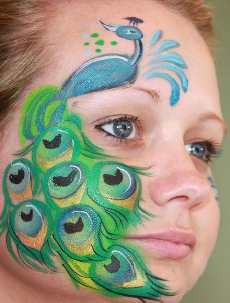 I like the tail draping down the face. Peacock Face Paint, Peacock Face Painting, Peacock Makeup, Mime Face Paint, Animal Face Paintings, Christmas Face Painting, Face Painting Easy, Face Paint Makeup, Kids Face Paint