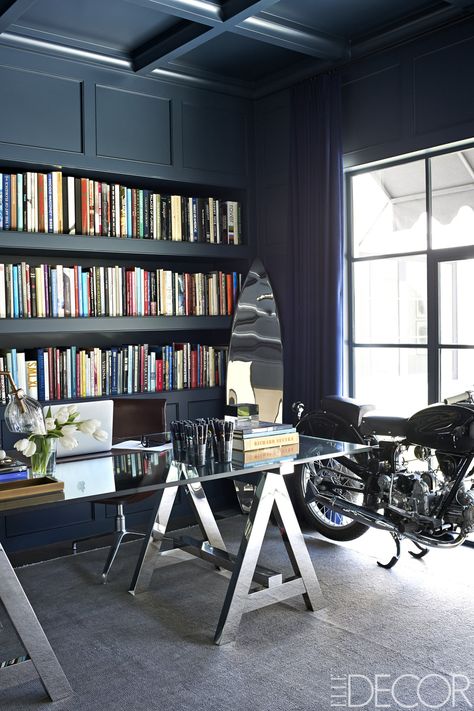 Giannulli's office holds a desk by Ralph Lauren Home, a Marc Newson surfboard sculpture, and a 1952 Moto Guzzi motorcycle; the curtains are of a wool by Loro Piana, the rug is by Beauvais, and the walls and ceiling are lacquered in Benjamin Moore's Polo Blue.   - ELLEDecor.com Navy Home Office, Blue Benjamin Moore, Light Blue Sofa, Blue Home Offices, Home Workplace, Lori Loughlin, Neutral Furniture, Car Furniture, Bright Homes