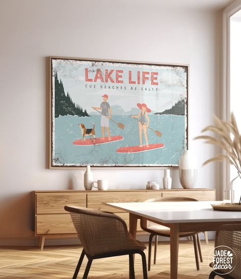 This custom vintage lake sign is a truly unique addition to your lake house decor! The distressed lettering and antique texture add effortless, relaxed style to your home. This one-of-a-kind art print can be personalized with ANY LAKE in the world, and your choice of text above or below it. There are also several sports to choose from! Available printed on canvas, paper, or aluminum, framed or unframed, these make wonderfully thoughtful gifts!  🔸 HOW TO ORDER 1️⃣ Place your order, writing the f Modern Lake House Decor Interior Design, Lake Cabin Decorating Ideas, Vintage Lake House Decor, Lake House Decorating Ideas, Vintage Lake House, Modern Lake House Decor, Distressed Lettering, Treehouse Cabins, Dog Beagle