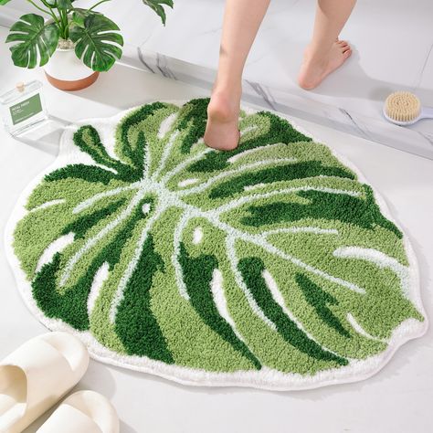 PRICES MAY VARY. UNIQUE DESIGN: Large Leaf shaped bathroom mat size is 26 inches X 32 inches, the monstera leaf pattern of the microfiber plant runner rug will bring hawaiian and tropical style to your floors. HIGH QUALITY: This large monstera leaf tufted bath mat is made out of 100% high quality density polyester thicker microfiber material, super soft. MACHINE WASHABLE: You can keep this green monstera leaf pattern bathroom rug looking like new by machine washing it in cold water, and drying o Fun Bathroom Rugs, Plant Bathroom, Green Bath Mat, Cute Bath Mats, Tropical Bathroom, Shower Mat, Tropical Style, Rug Bathroom, Bathroom Mat