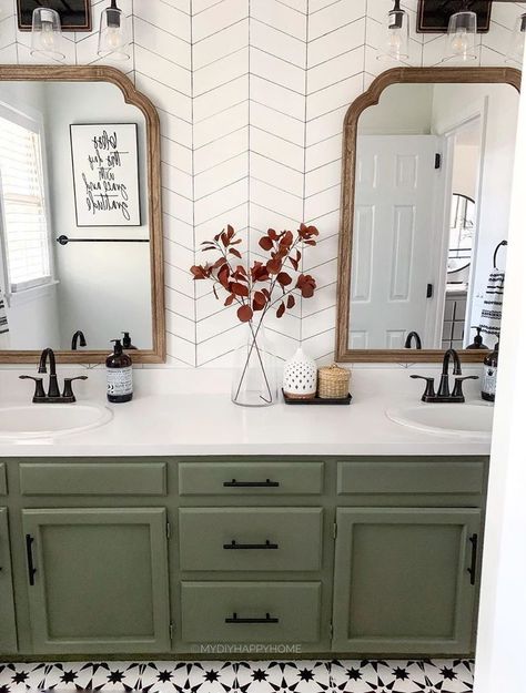 From couches to cabinets, green seems to be everywhere this year—but there’s still nothing quite like the queenly of-the-moment vibes of these sage-green cabinets from @mydiyhappyhome. “Sage-green cabinetry has been trending in kitchens for a couple years now and has finally found its way into the bathroom,” says Dudley. “Sage green feels fresh, organic, and inviting. It also looks great with brass or matte-black hardware.” Trending Home Decor, Bad Inspiration, Green Cabinets, Bathroom Trends, Upstairs Bathrooms, Bathroom Redo, Bathroom Remodel Master, House Bathroom, Black Hardware