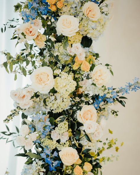 Happy Wedding Wednesday! We received an invitation to style a Greece-inspired wedding for the cover of Wedding Day Magazine!! We went all-out with a soft palette of creams, ivorys, blues, and stunning lemony yellows. Creamy roses, buttery ranunculus, peonies, delph, wild nigella, and playful pops of yellow craspedia made us feel like we were having a luxurious lunch on the coast of Santorini!! 🍋🍋 A broken arch of multicolored flowers softened Chez's neutral industrial space and a wow-worthy f... Light Blue And Yellow Wedding, Yellow Craspedia, Blue And Yellow Wedding, Blue Green Wedding, Yellow Wedding Theme, Multicolored Flowers, Wedding Wednesday, Yellow Wedding Flowers, Soft Palette