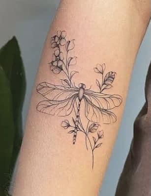 Floral Tattoo With Dragonfly, Arm Tattoos For Women Dragonfly, Dragonfly Wildflower Tattoo, Dragon Fly Tattoo Back Of Arm, Half Dragonfly Half Flower Tattoo, Dragon Fly Flower Tattoo, Dragon Fly Tattoo With Flowers, Flowers And Dragonfly Tattoo, Dragon Fly With Flowers Tattoo