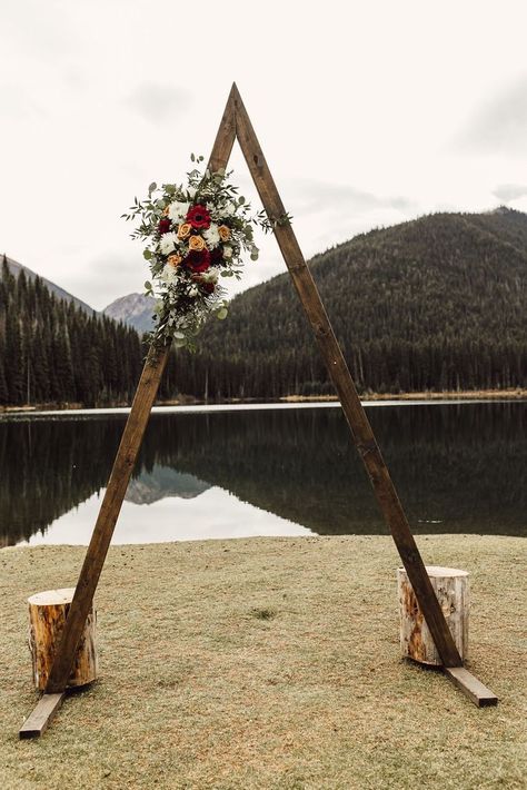 Wooden triangle A-frame wedding arch for ceremony and reception backdropwith floral bouquet. Wooden Decoration Ideas, Wooden Wedding Arches, Wedding Arbors, Reception Backdrop, Wooden Home Decor, Backdrop Frame, Arch Backdrop, Wedding Arch Flowers, Arch Flowers