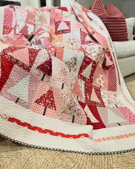 Jina Barney on Instagram: "My favorite Christmas quilt to display is my Pink Christmas Tree… it adds such a fun Christmas vibe to my living room and makes me feel the warm fuzzy feelings of Christmas. The last picture is @loriwoodsstudio @patrickatpoppiecotton quilt I made 2 Christmas’s ago… I love this version with pinks, reds and teals! . Fabric is @poppiecotton Batting is @hobbsbatting Quilting is @connies_quilts . #poppiecottonfabric #poppiecotton #lovepoppiecotton #beautifulquilts #christmasquilts #treequilts #pinkquilts #loriwoodsstudio #jinabarneydesignz" Pink Christmas Quilt, Christmas Tree Quilt, Christmas Vibe, Pink Quilts, Red Quilts, Tree Quilt, Block Of The Month, Pink Christmas Tree, My Living Room