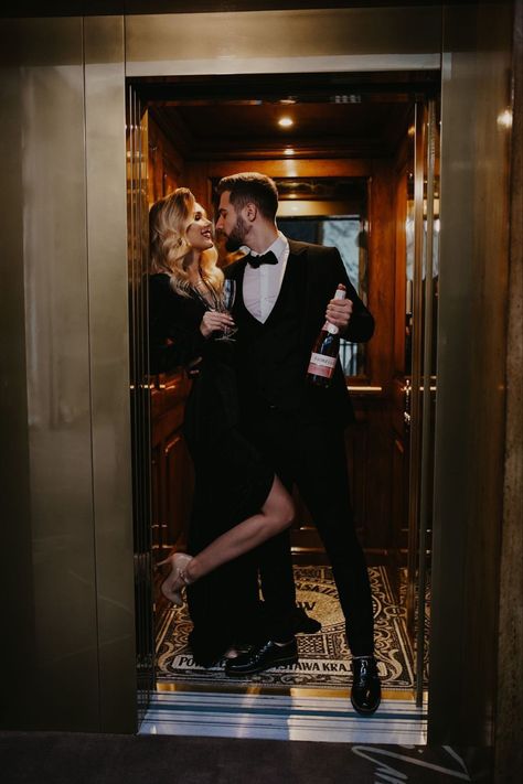 Couples Photoshoot Suit And Dress, Couple Poses Elevator, Old Hollywood Glamour Couple Photoshoot, Old Money Aesthetic Couple Photoshoot, Hotel Lobby Couple Photoshoot, Elegant Couple Photos, Mafia Engagement Photos, Elevator Engagement Photoshoot, Elevator Couple Photos