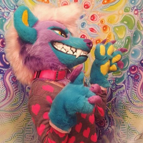 Picture by serieswvsk on Twitter of a rainbow hyena fursuit!! Fursuit Mohawk, Cabbage Dog Fursuit, Pig Fursuit, Rainbow Fursuit, Sparkledog Fursuit, Moth Fursuit, Possum Fursuit, Lion Fursuit, Hyena Fursuit