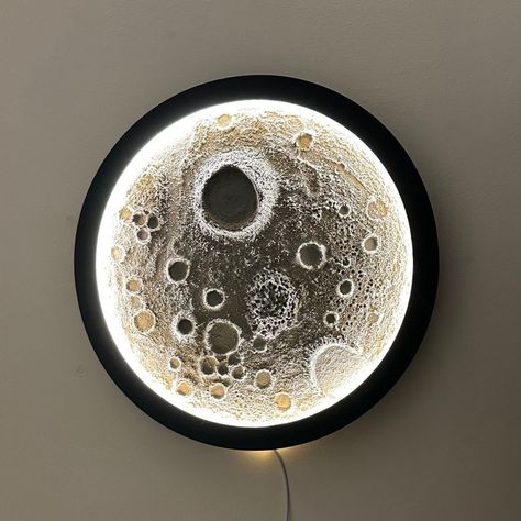 Handmade Moon Wall Night Light: Illuminate Your Space with Celestial Magic (18 inch) Enhance your home with this moon wall decor that doubles as a lunar night light. Perfect for celestial home decor, this piece features a detailed moon surface texture that brings the beauty of the moon right into your living space. This wall-mounted moon is handcrafted with care, making it an ideal addition to any room, especially as a nursery night light. Embrace the cosmos with this cosmic wall art that showca Moon On Wall Decor, Moon Texture Art, Moon Light Lamp, Moon Room, Lamp Moon, Moon Night Light, Moon Wall Decor, Moon Texture, Canvas Art Gifts