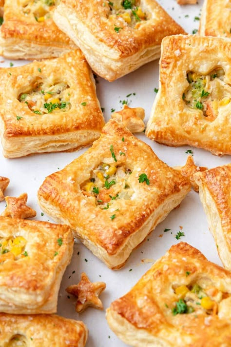 These mini chicken pot pies with puff pastry are a like my classic chicken pot pie but in hand pie form! They have a crispy, flaky puff pastry stuffed with a creamy filling of fresh vegetables and tender chicken! They're the perfect single serving savory appetizer. Mini Pastries Savory, Monte Cristo Puff Pastry, Puff Pastry Patties, Mini Chicken Pies, Chicken Filo Pie, Chicken With Puff Pastry Recipes, Christmas Breakfast Pastries, Chicken Hand Pie, Chicken Pot Pie Puff Pastry