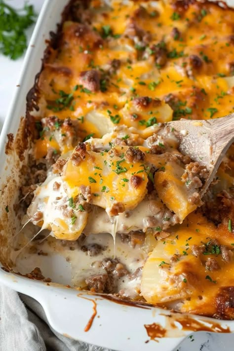 This sausage potato casserole is savory, creamy, and oh-so cheesy! It's an easy meal the entire family will flip for. Ground Sausage Potato Recipes, Ground Sausage Potato Casserole, Sausage Potatoes Casserole, Creamy Sausage And Potato Casserole, Creamy Sausage And Potatoes, Ground Sausage And Potatoes Recipes, Italian Sausage Potato Casserole, Ground Sausage And Potatoes, Ground Sausage Casserole