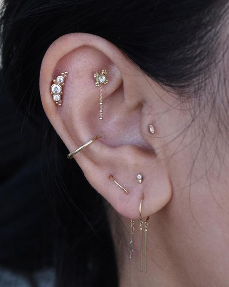 Styled this ear many moons ago! Today we upgraded the Faux Rook to “Grace” by @mayajewelry ✨ So many new designs and styles from the safe… | Instagram Maximalist Earring Stack, Ear Project, Piercing Designs, Minimalist Ear Piercings, Cool Ear Piercings, Ear Style, Piercing Ideas, Ear Piercing, Jewelry Inspo