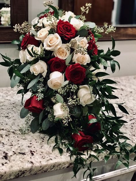 My wedding bouquet with deep red roses, cream roses, and greenery! @Rockingham,NC Red Rose Bouquet Wedding, Pretty Wedding Bouquet, Wedding Flower Guide, Champagne Flowers, Red And White Weddings, Red Wedding Theme, Red Bouquet Wedding, Red Rose Wedding, Summer Wedding Bouquets