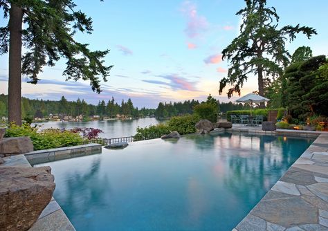 Large rock swimming pool overlooking lake Infinity Pool Backyard, Lake House Backyard, Pool Life, House Backyard, Infinity Edge Pool, Luxury Pools, Pool Construction, Lake Oswego, Dream Pools