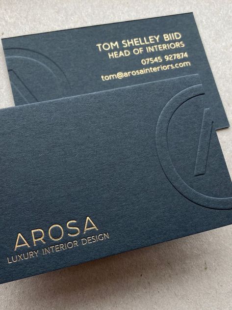 Embossed logo with gold foil printed text on a slate grey business card. Interior Design Card, Debossed Business Card, Etsy Business Cards, Architecture Business Cards, Interior Designer Business Card, Stationery Business Card, Gold Foil Business Cards, Elegant Business Cards Design, Embossed Business Cards