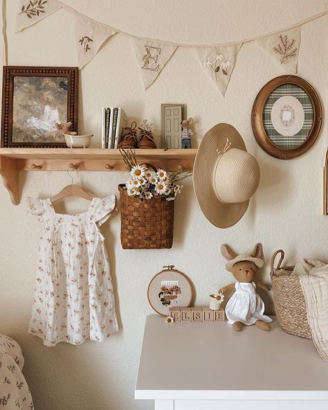 Randi Jarvis on Instagram: “Some of my favorite summer things; sundresses, sun hats, and wildflowers 🌿🌼🧺Time home with my babies is my absolute favorite part of this…” Garden Theme Nursery Vintage, The Secret Garden Nursery, Vintage Nursery Shelf Decor, Vintage Style Playroom, Vintage Girl Room Ideas, Vintage Country Nursery, Vintage Inspired Girls Room, Vintage Girly Nursery, Vintage Cottage Core Nursery