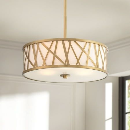 Complement an elegant living or dining room with a modern drum pendant. From Possini Euro Design, it boasts a crisp, timeless silhouette that brightens your dining table or sitting area with an off-white inner drum and frosted white diffuser underneath. The outer cage shade features a gold finish over random scattered lines, creating an artistic look that complemented without overwhelming. Size: 21 x 33 x 13. Kitchen And Dining Room Lighting, Living Room Lights, Kitchen Table Lighting, Drum Pendant Light, Cream Bedrooms, Gold Pendant Light, Gold Light Fixture, White Diffuser, Drum Pendant Lighting