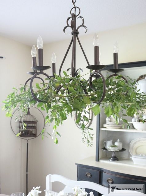 Adding Holiday Greenery to Simple Chandeliers - The Crowned Goat Chandelier With Greenery, How To Decorate A Chandelier, Chandelier Greenery, Decorating Chandeliers, Boho Garden Party, Simple Chandelier, Vintage Wedding Table, Outdoor Chandeliers, Outdoor Chandelier