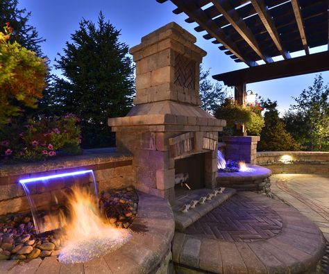 outdoor fireplaces with water feature | Outdoor Fireplaces - Elemental Landscapes Ltd. Patio Water Feature, Landscaping Water Feature, Diy Water Fountain, Air Mancur, Outdoor Fireplace Designs, Outdoor Patio Designs, Patio Fireplace, Backyard Fireplace, Backyard Water Feature