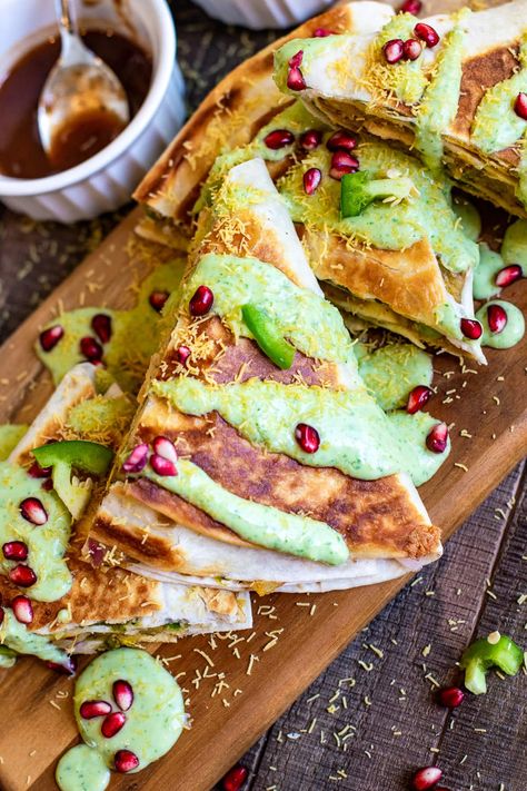 This Samosa Chaat Crunch Wrap recipe is my fun spin on the very popular Indian samosa. All the flavors of a samosa tucked in a wrap, but healthy. It is a delightful Indian Mexican fusion recipe for your next meal or a party. #fusionrecipe #samosa #chaat Crunch Wrap Recipe, Masala Corn, Mexican Fusion, Mango Panna Cotta, Samosa Chaat, Crunch Wrap, Samosa Recipe, Indian Appetizers, Fusion Dishes