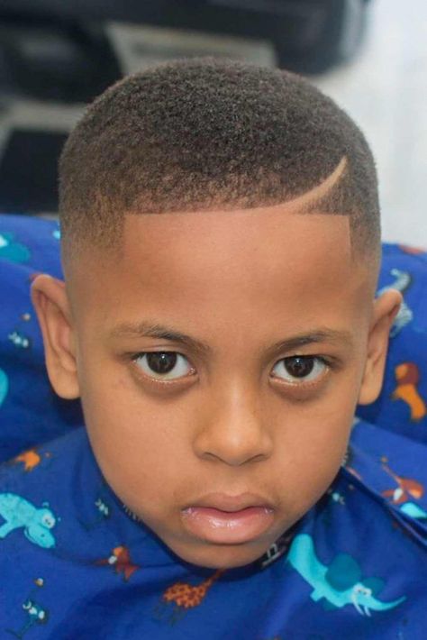 Black Boys Haircuts And Hairstyles (2021 Update) | MensHaircuts.com Hairstyles For Men Fade Style, Black Boys Haircut Trendy, Haircut For Boys Kids Trendy, Short Boys Haircut Trendy, Black Boys Haircuts Kids, African American Boy Haircuts, Black Kids Haircuts, Haircuts For Black Boys, Black Boys Haircuts Fade