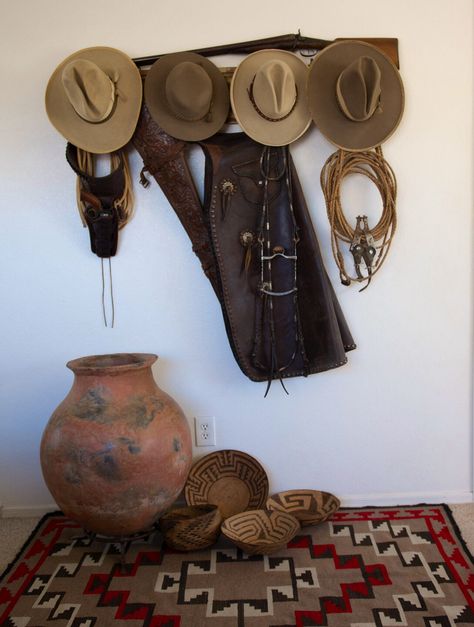 Some of my vintage/antique cowboy items-old original Stetson hats, an antique Papago wine olla and Pima Indian baskets Wild West Home Decor, Old Western Decor Ranch Style, Urban Cowboy Lodge, Cowboys And Indians Decor, Western Cowboy Decor, Old Western Aesthetic Home, Classic Western Decor, Old Western Home Decor, Vintage Cowboy Decor