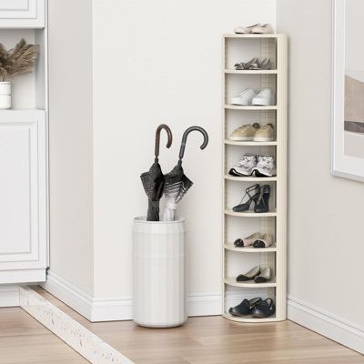 Each layer of this rack stands tall at 6.3 inches, offering ample space for various items. The panel measures 11 inches by 11 inches, providing a sturdy foundation for your belongings. The best part? You can easily expand your storage by purchasing multiple sets and mix and match them according to your needs.While it excels as a shoe rack, this versatile organizer isn't limited to just one role. Utilize it as a bathroom corner storage unit to tidy up your toiletries, or place it in the living ro Corner Shoe Storage Entryway, Corner Shoe Rack Ideas Small Spaces, Mini Shoe Rack Small Spaces, Shoe Corner Storage, Shoe Rack Small Space, Corner Shoe Shelf, Corner Shoe Storage, Corner Shoe Rack, Elegant Organization