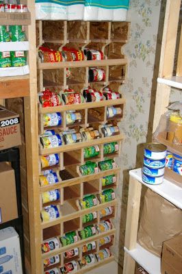 Here is a quick snap of some can rotation shelves that I put together a couple weeks back.  We have 7 shelves with 4 slots ea.  Each slot wi... Can Rotation System Diy, Storage For Canned Goods Mason Jars, Canned Good Storage, Diy Food Storage, Shelves Pantry, Corn Food, Food Rotation, Food Storage Rooms, Food Storage Shelves